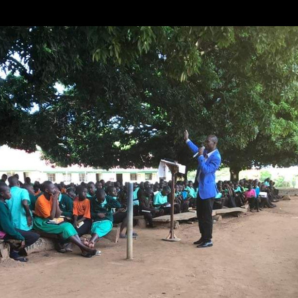 PASTOR SIMON OGOLLA  MINISTERING